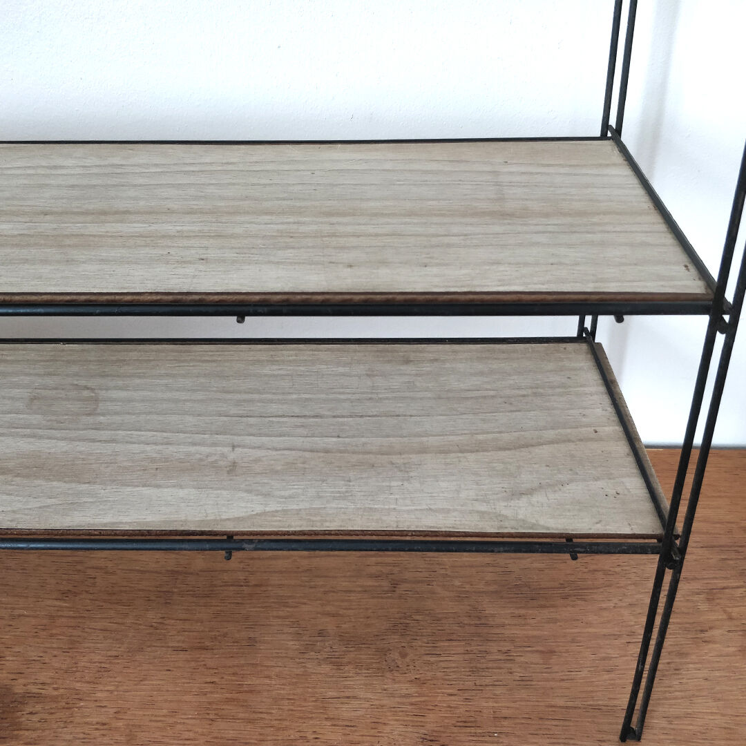 Metal wall thong shelf