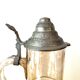 Vintage glass and tin jug