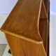 Asymmetric shelf