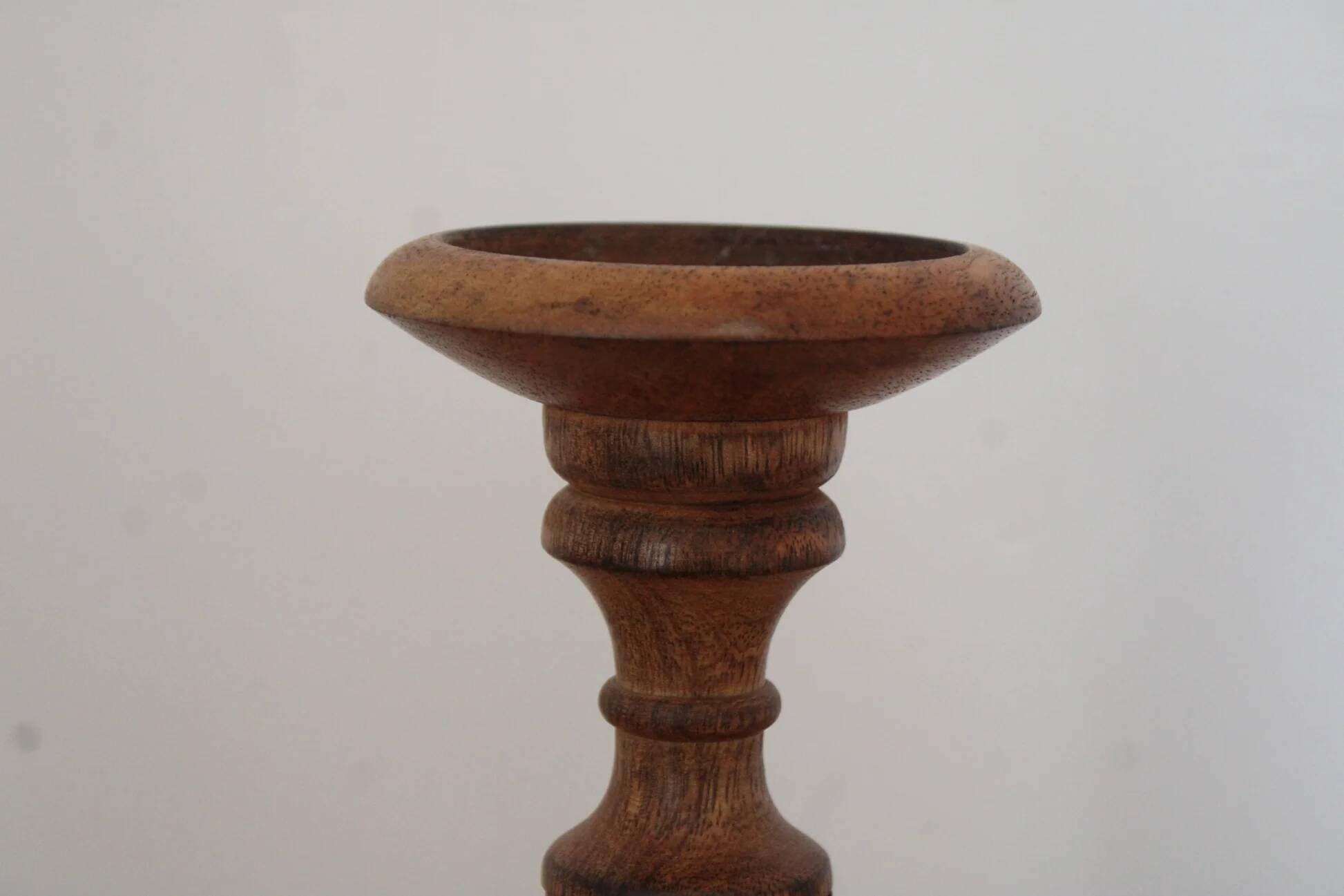 Turned and carved wooden candlestick with foliage decoration – H 20 cm