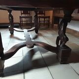 Breton dining room table with 2 extensions and 6 chairs with carved Breton characters