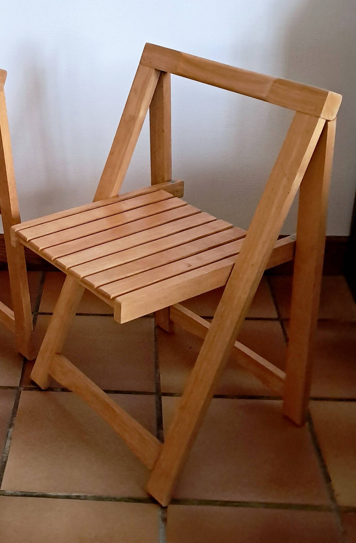Wooden folding chair in the style of Aldo Jacober