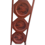 Chinese folding pedestal table in red lacquered wood