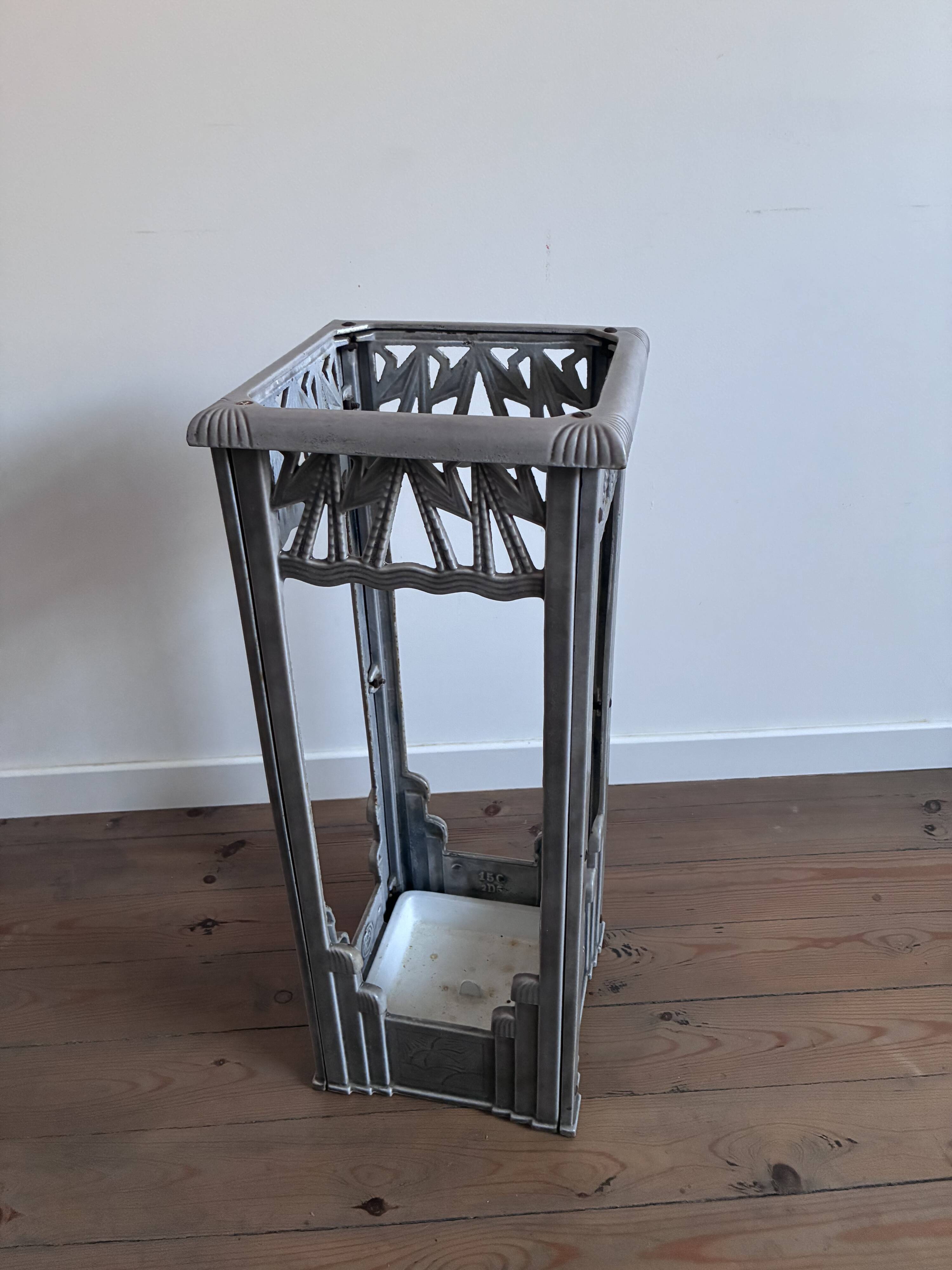 Art Deco umbrella stand from the 1930s, cast iron.