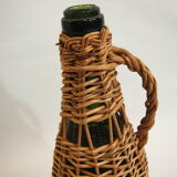 Bouteille en rotin vintage