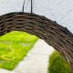 Vintage sun mirror in woven wicker