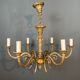 Bronze chandelier with ram's head motifs in the Louis XVI style, in the manner of Maison Jansen.