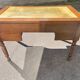 Louis Philippe desk in walnut, with a leather top.