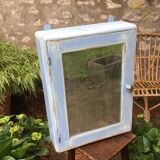 Small blue vintage pharmacy cabinet