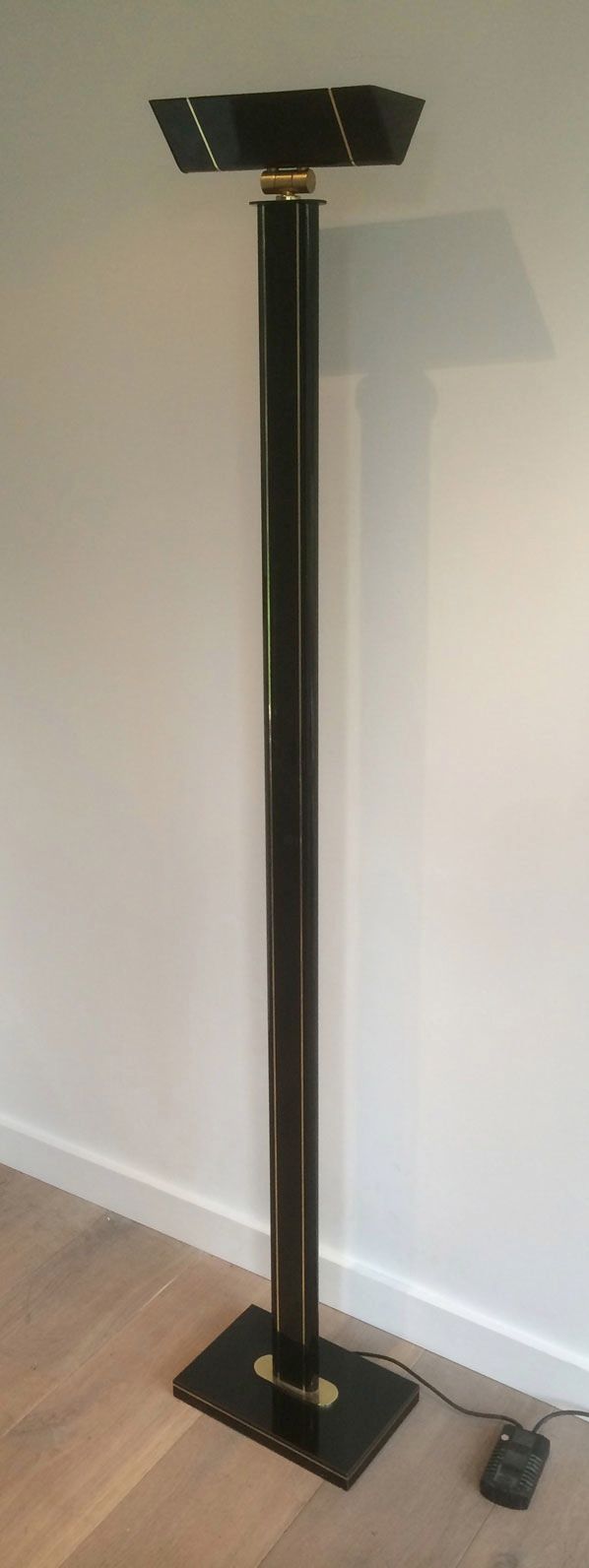 Black lacquered and brass floor lamp