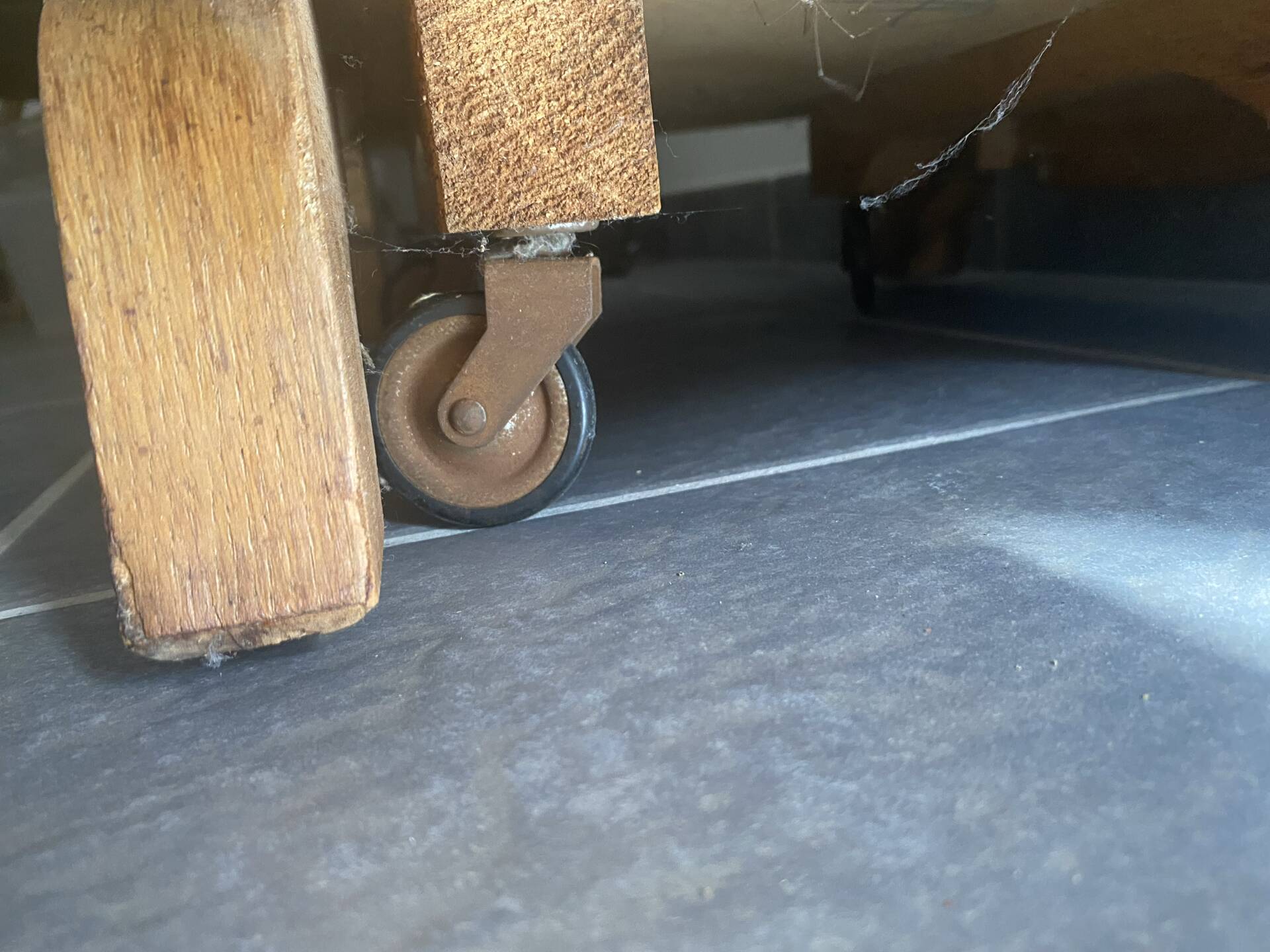 Rotating wooden bar cart from the 1950s.