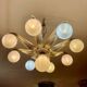 Art Deco ceiling light in bronze with 9 glass globes, France 1935