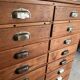 Old apothecary trade furniture in vintage wood 24 drawers.