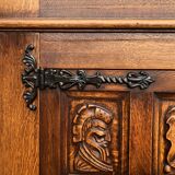 Spanish furniture with carved wood profiles and coats of arms from the 1950s.