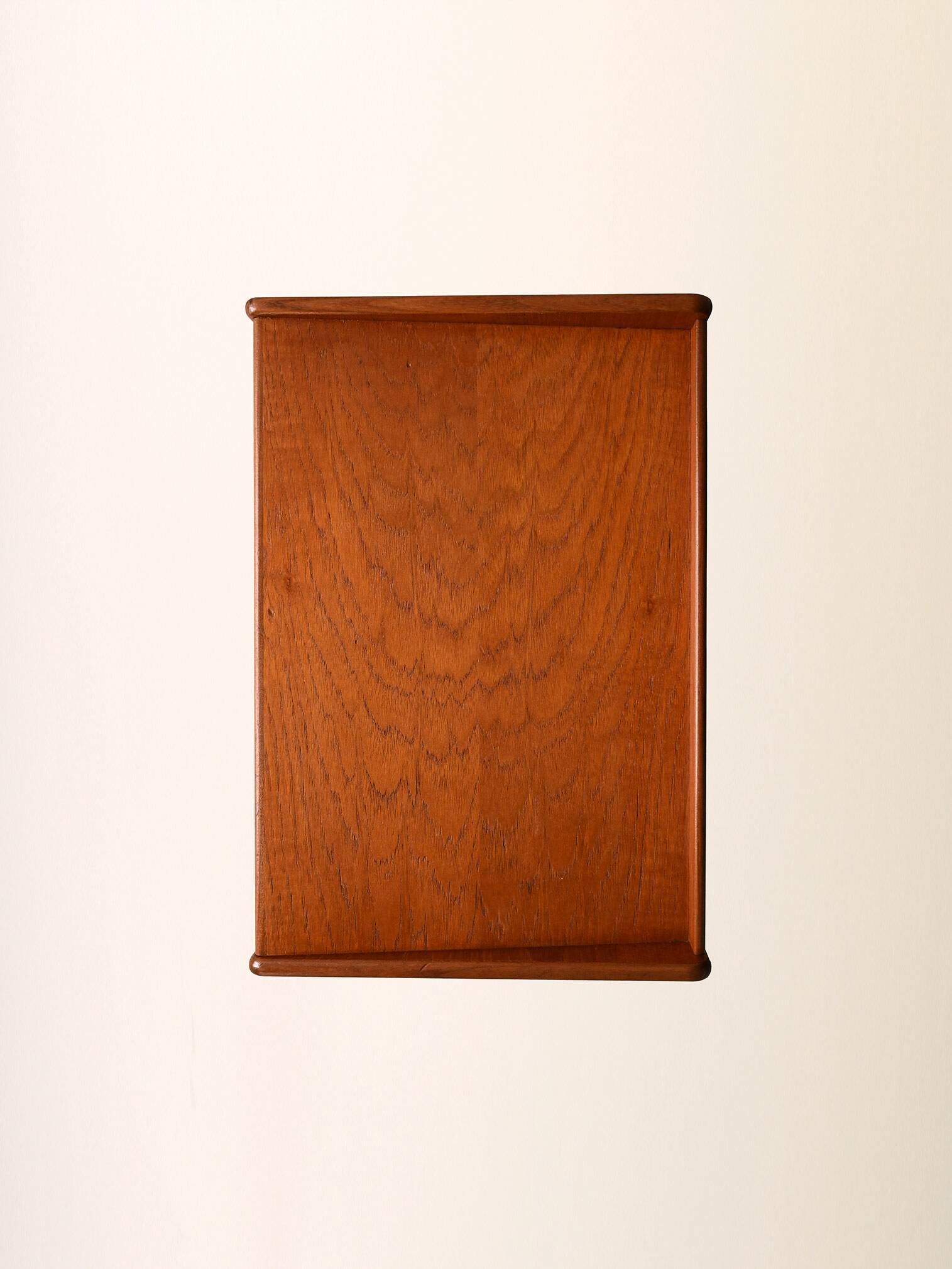 Bedside table with rattan magazine rack