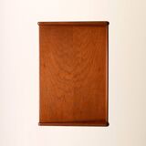 Bedside table with rattan magazine rack