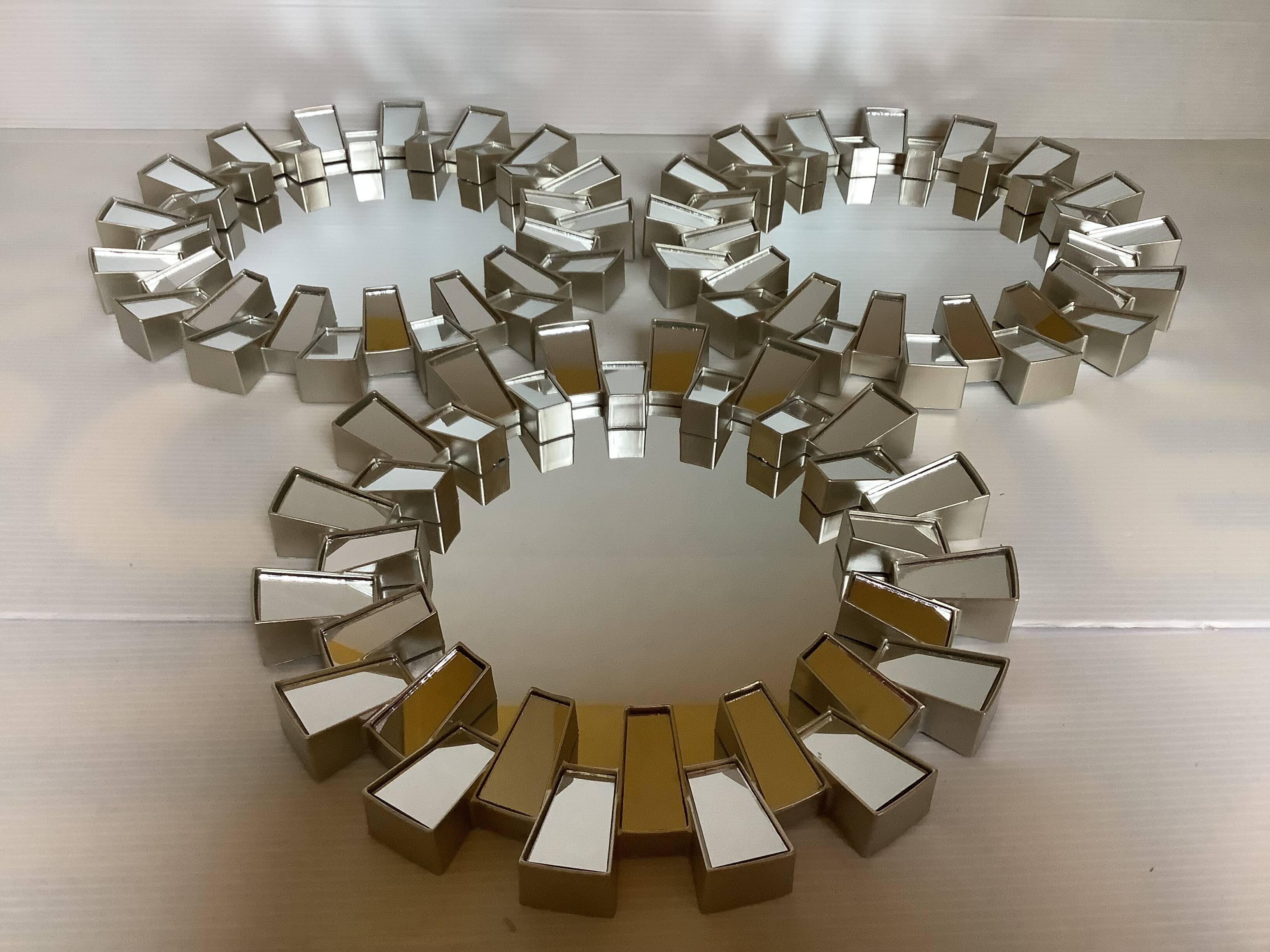 Trio of silver-framed mirrors