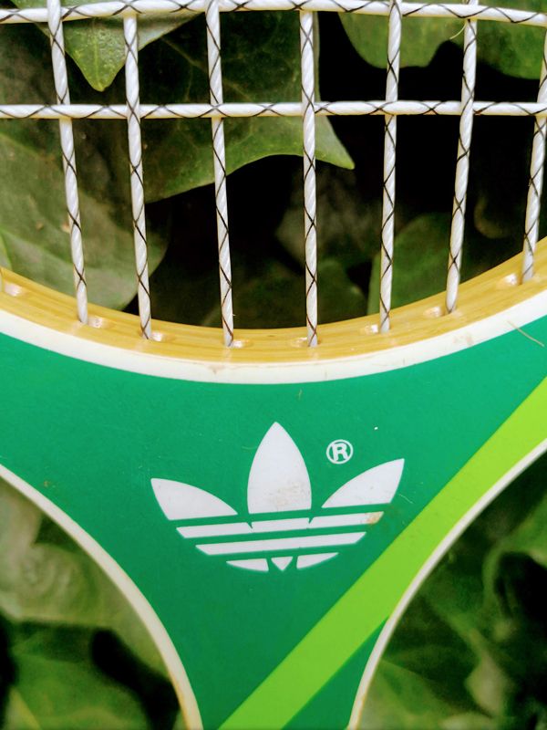 Pair of vintage Adidas Ilie Nastase & Junior tennis rackets