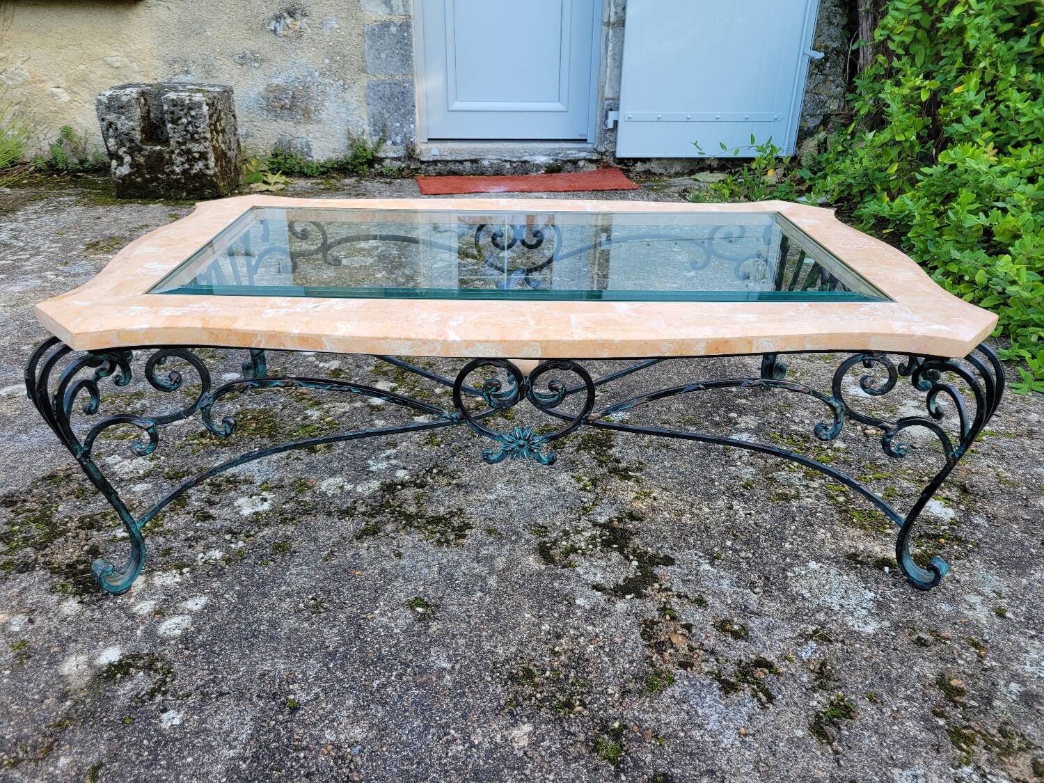 Pink marble and wrought iron coffee table