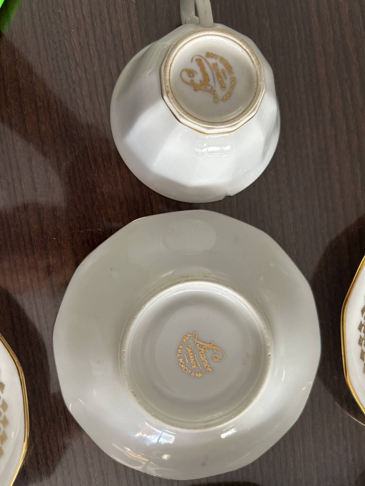 a vintage coffee or tea set in white porcelain with patterns and