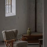 Pair of modern Swedish lounge chairs, shearling sheepskin and elm, 1940s.