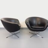 Pair of vintage Scandinavian swivel armchairs in faux leather and chrome.