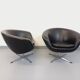 Pair of vintage Scandinavian swivel armchairs in faux leather and chrome.