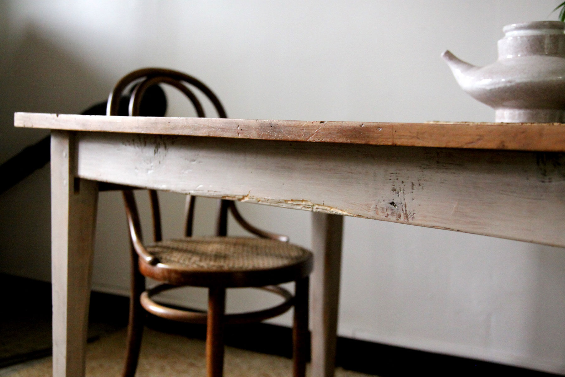 Patinated wooden dining table