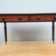 English desk with 2 drawers on green leather