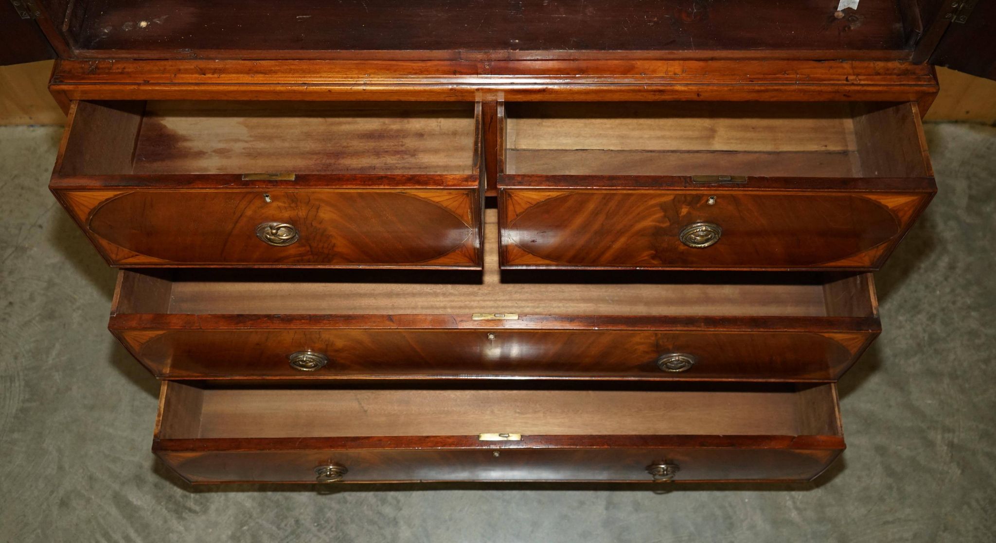 George III Sheraton linen cupboard in walnut, circa 1760.