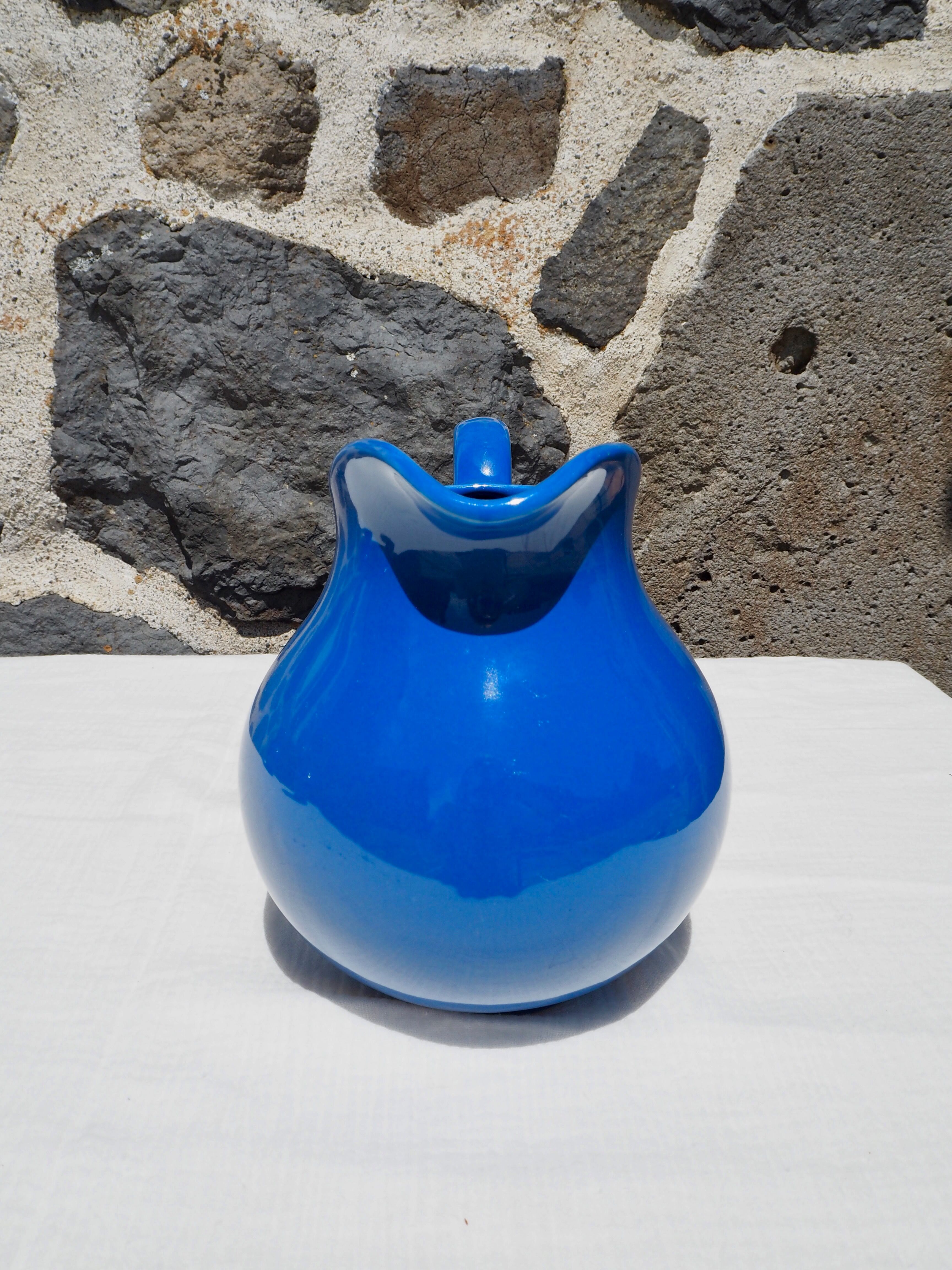 Blue ceramic belly pitcher