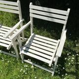 Folding slatted garden armchairs