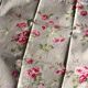 A set of 6 mismatched floral and bird-themed napkins