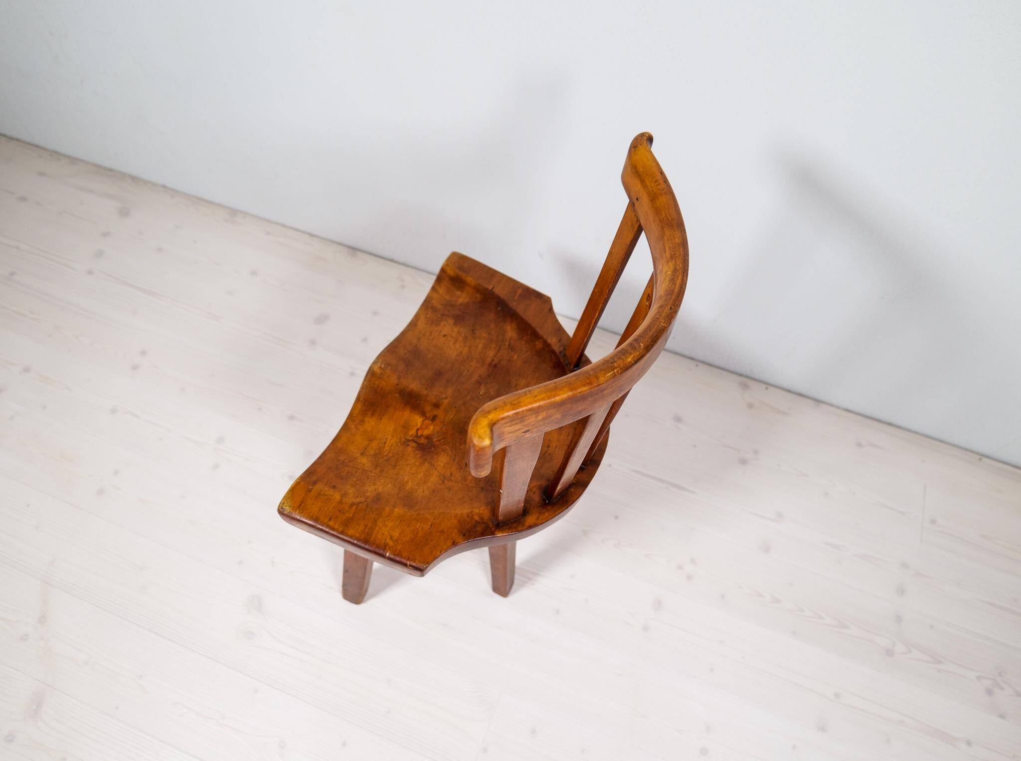 Swedish folk art chair from the 19th century with highly decorative forms.