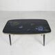 Vintage coffee table with glass top and angled legs