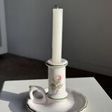 Small vintage hand-held candlestick in earthenware with green trim and floral decoration H10.5