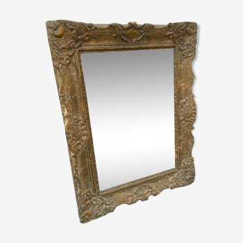 Patinated carved wooden mirror