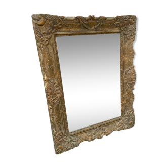 Patinated carved wooden mirror