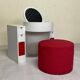 Bathroom toilet with a 70s pouf.