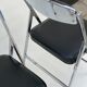 Pair of italian chrome and leather folding chairs