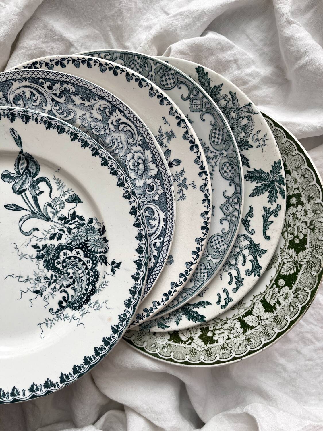 6 mismatched Saint Amand ironware dessert plates