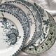 6 mismatched Saint Amand ironware dessert plates