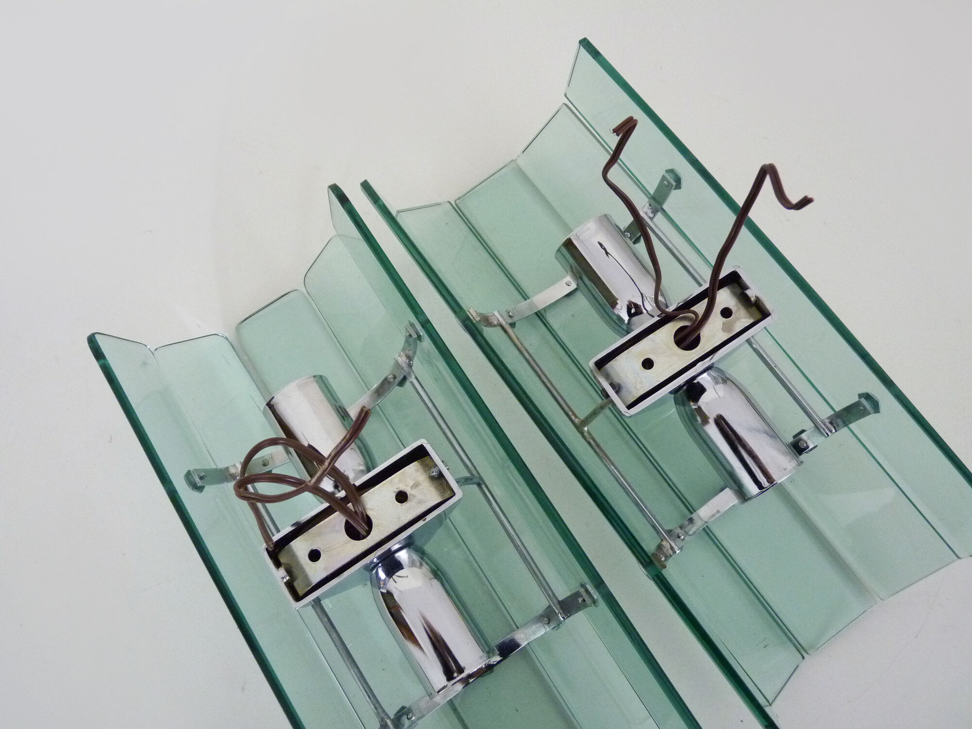 Pair of Italian Veca wall lamps in bluish glass, chrome, double lights