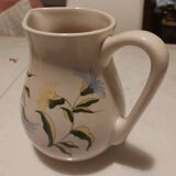 Moustiers style floral motif earthenware pitcher signed