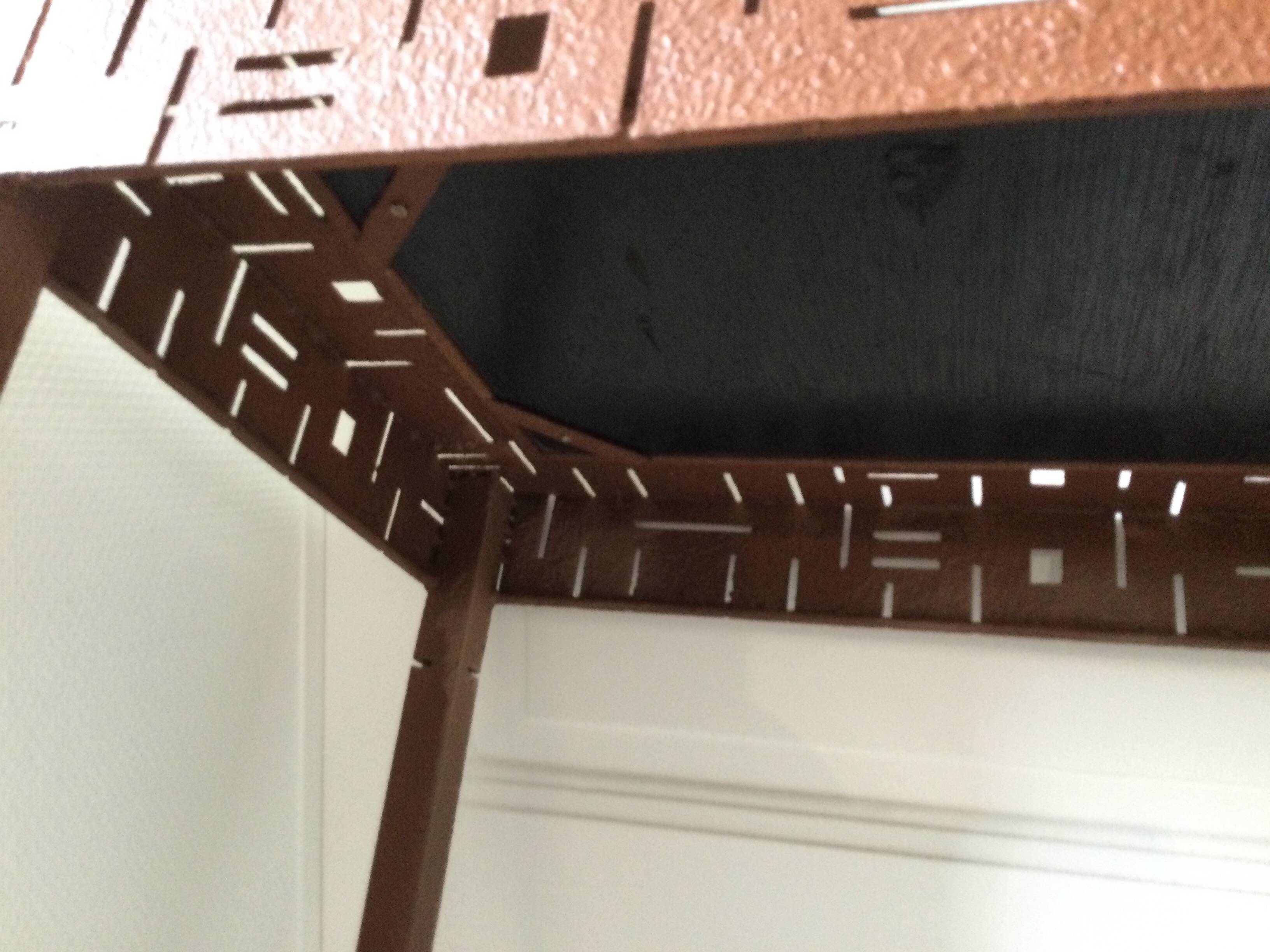 Perforated sheet metal and wood console