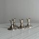 4 vintage metal candle holders