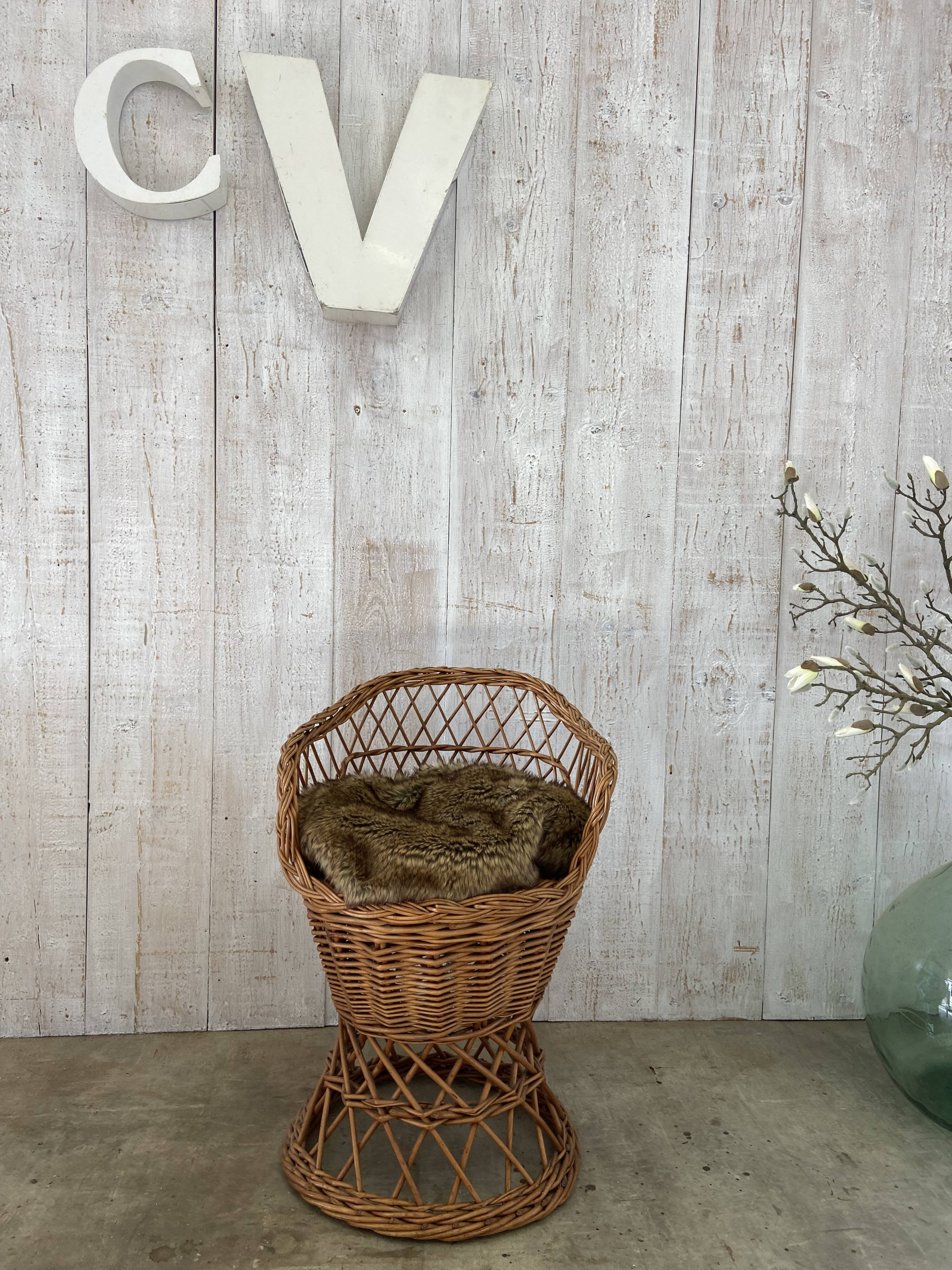 Vintage wicker children's armchair