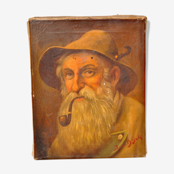 Portrait old old man smoking pipe