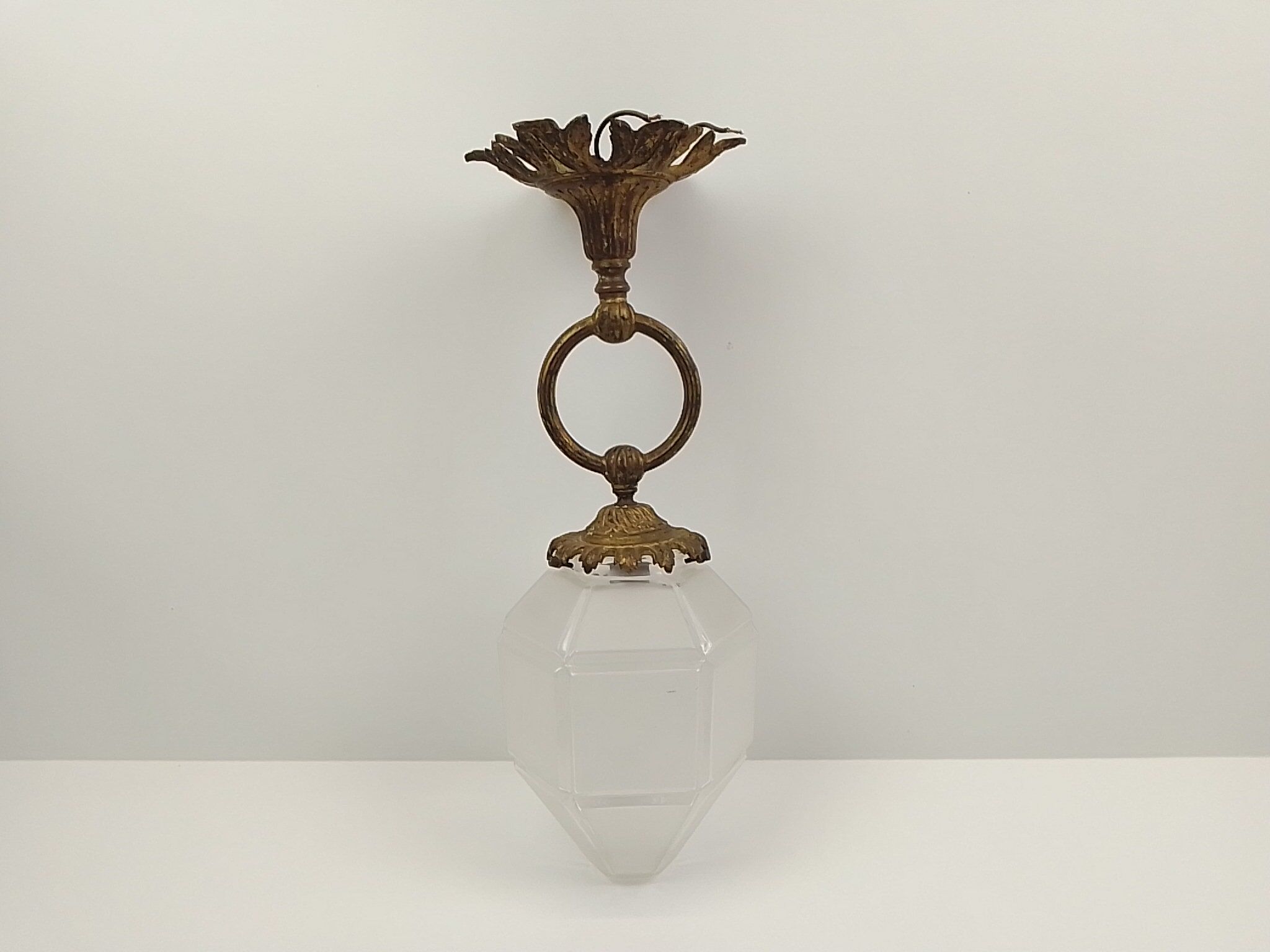 Vintage chandelier in brass and glass
