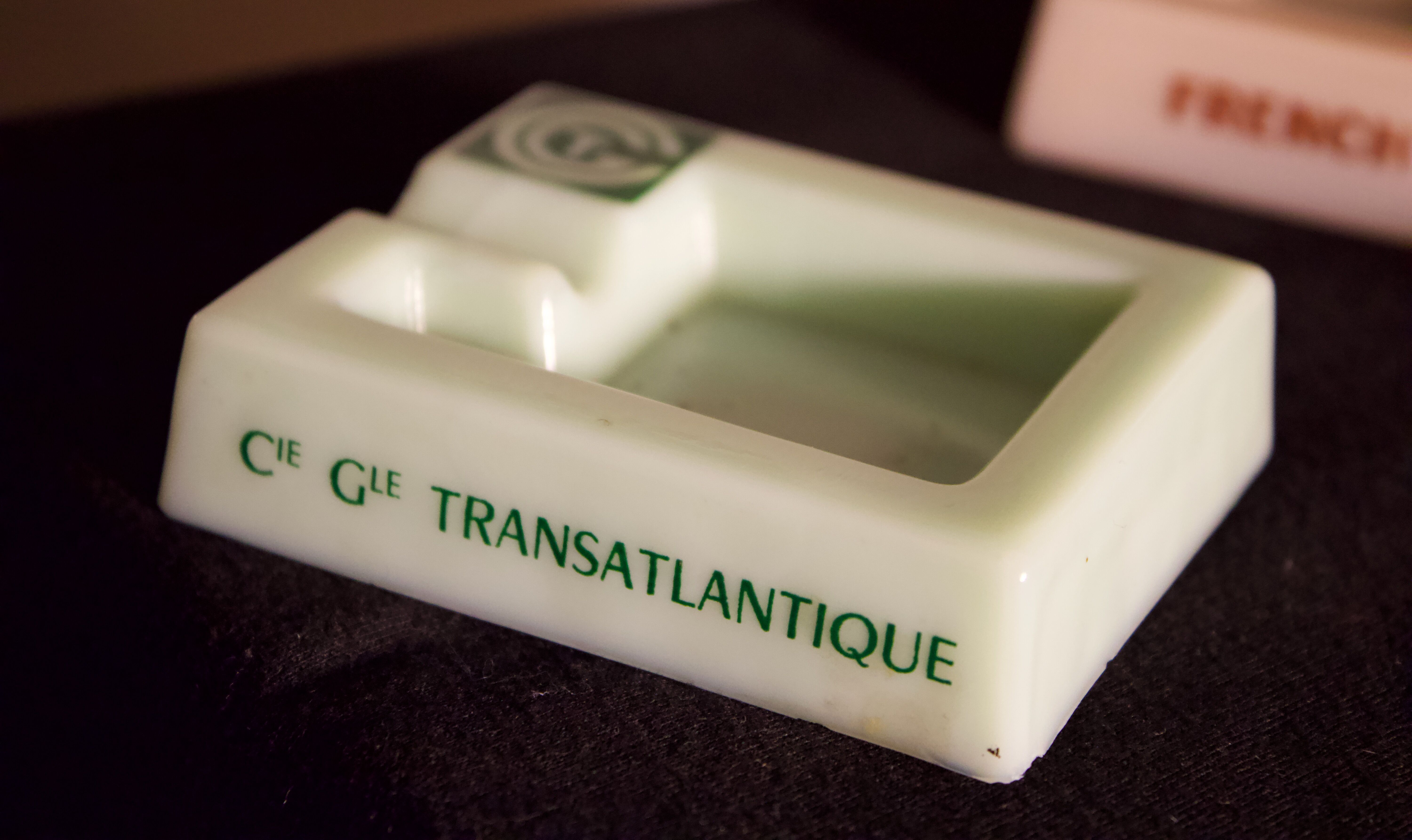 Three opalex ashtrays at the Logo of the Trans-Atlantic General Company - French Line - Model created by Jean Luce for the cruises of the liner Normandy and France